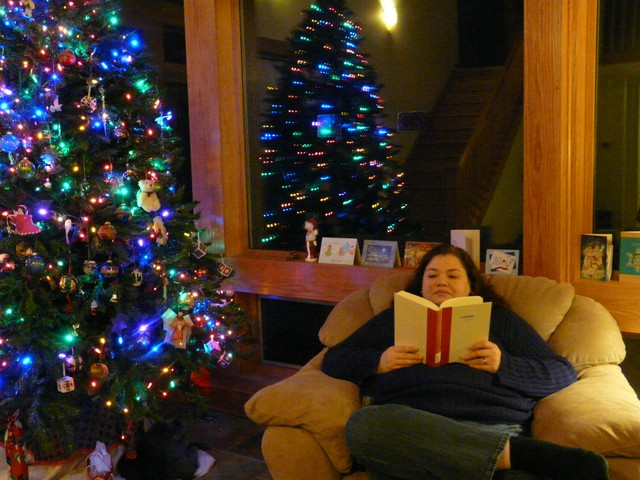 Robin reading a book later in the evening