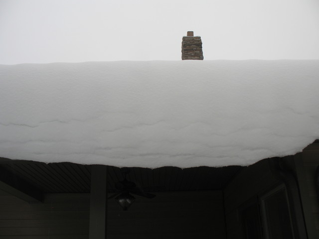 I thought this was sort of a neat picture (by Kailyn again): snow curl and chimney