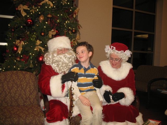 December 21: Connor visiting with Santa and Mrs. Claus at the Surgery Center