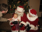 She had fun ringing the bell but didn't want to let go of daddy, just in case :)