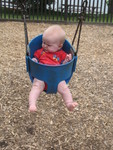 She spent most of the time staring and poking at the rivets on the side of the swing