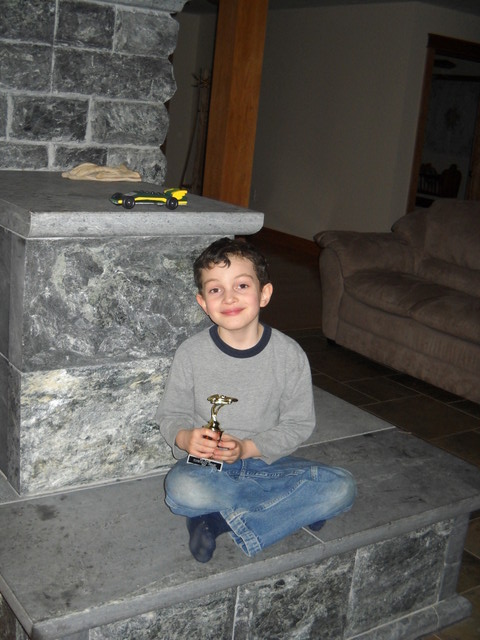 Connor with his Pinewood Derby trophy