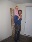 Don and Brianna showing height. These shorter racks will go on the north wall, and they'll be topped with a shelf that runs the length of the room.