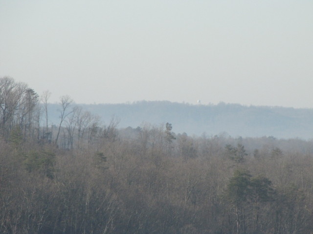 Ridge across from the house, taken from the bedroom.  I think that small white thing is the Crab Orchard water tower poking up!