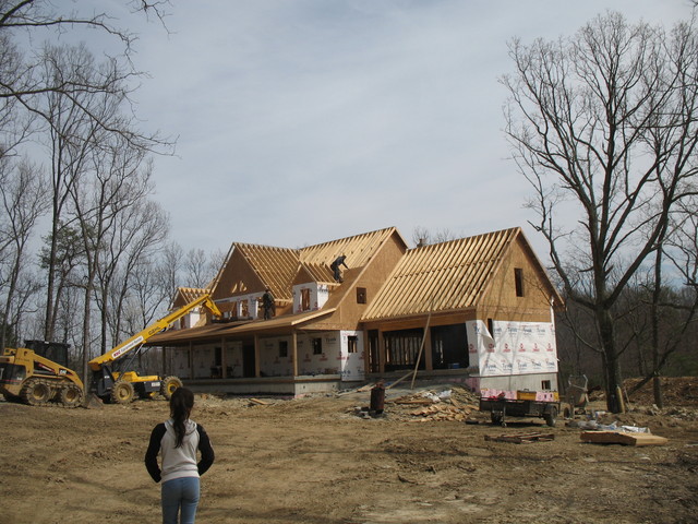 April 2: They're putting on roof sheeting!