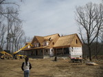 April 2: They're putting on roof sheeting!