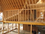 Living room rafters and roof sheeting beyond