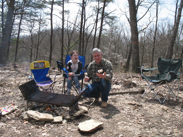 Kailyn and dad roasting marshmallows. Dad's was so soft it was trying to fall off of his stick!