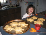 Kailyn with turtles, ready to bake.  She made their toes, shell markings, and eyes