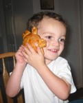 Connor hugging his turtle.  He hugged it for 3 or 4 minutes before finally starting to eat it.