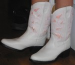 Kailyn's spiffy new boots, which she helped buy with the money she saved all summer