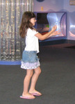 Kailyn with her hand in a bubble