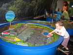 Connor playing in the model river