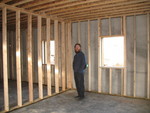 February 8: More house progress.  Southeast spare room, now with insulating walls inside the poured walls