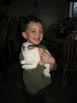 January 7: Connor with Marshmallow, who came home with us again this weekend