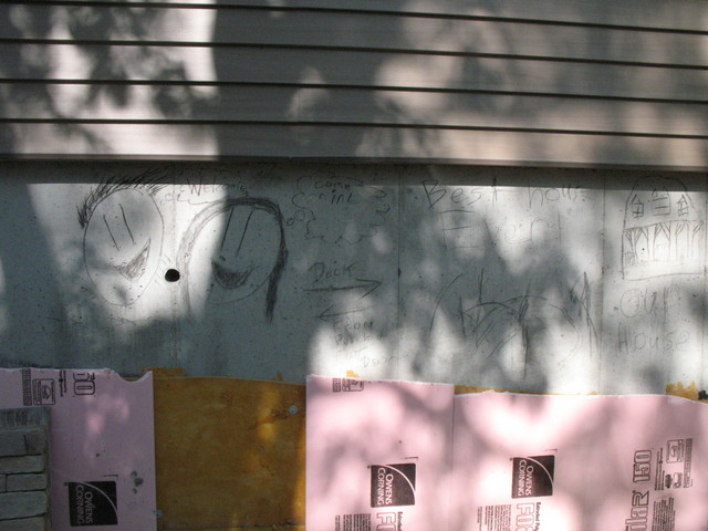 Graffiti by Kailyn on the west end of the house
