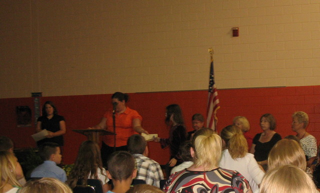 June 4: 5th grade graduation. Kailyn receiving the first of several awards -- this one for her performance on the academic team at the district competition