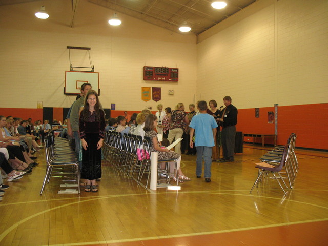 Getting ready to receive her graduation certificate